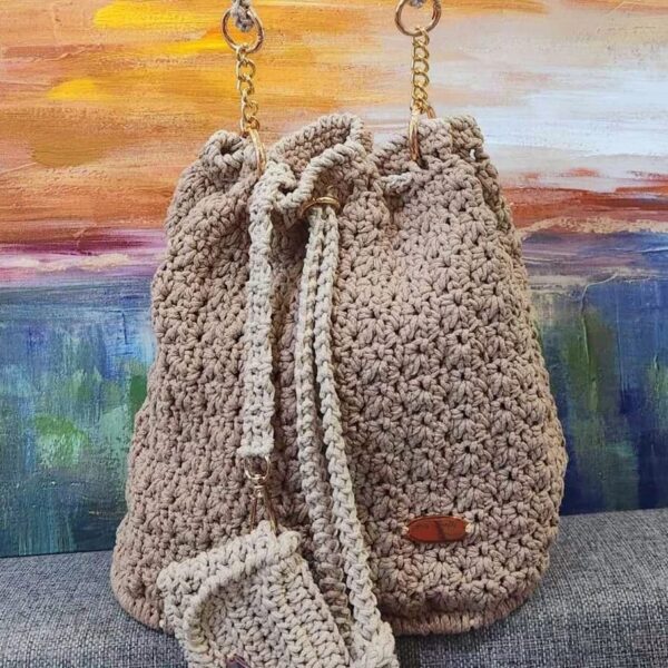 Handcrafted Serena Bag made with macrame cotton yarn, featuring a sturdy base and versatile design, created by Arty-Crafty by Vanessa.