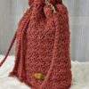 Handcrafted Serena Bag made with macrame cotton yarn, featuring a sturdy base and versatile design, created by Arty-Crafty by Vanessa.