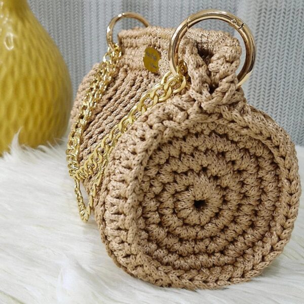 Handmade Beatriz Handbag with intricate macrame yarn art, featuring a gold-tone chain and versatile design, created by Arty-Crafty.