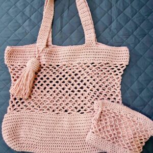 Handmade Peachy Beach Bag with macrame cotton yarn, featuring a spacious design and customizable colors, created by Arty-Crafty.