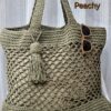 Handmade Peachy Beach Bag with macrame cotton yarn, featuring a spacious design and customizable colors, created by Arty-Crafty.