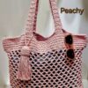 Handmade Peachy Beach Bag with macrame cotton yarn, featuring a spacious design and customizable colors, created by Arty-Crafty.