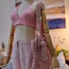 Handmade Peachy Beach Bag with macrame cotton yarn, featuring a spacious design and customizable colors, created by Arty-Crafty.