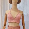 Handcrafted Chanti Bikini Set made from pink cotton and acrylic yarn, featuring a crochet halter top and matching bottoms,