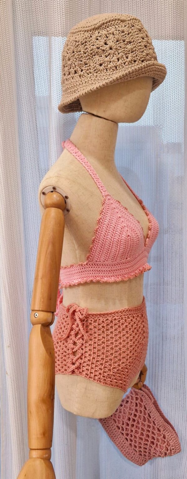 Handcrafted Chanti Bikini Set made from pink cotton and acrylic yarn, featuring a crochet halter top and matching bottoms,