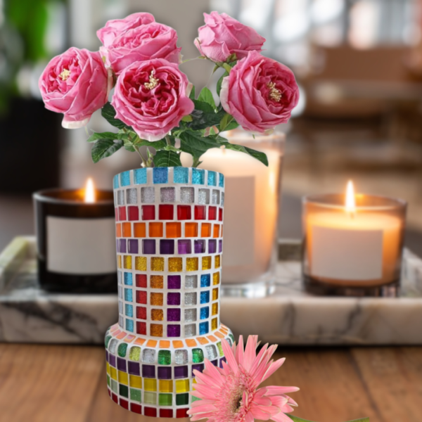 A handcrafted mosaic glass vase featuring colorful glass tiles arranged in vibrant patterns, sealed with white color, and measuring 10x20 cm, perfect for home or office décor.