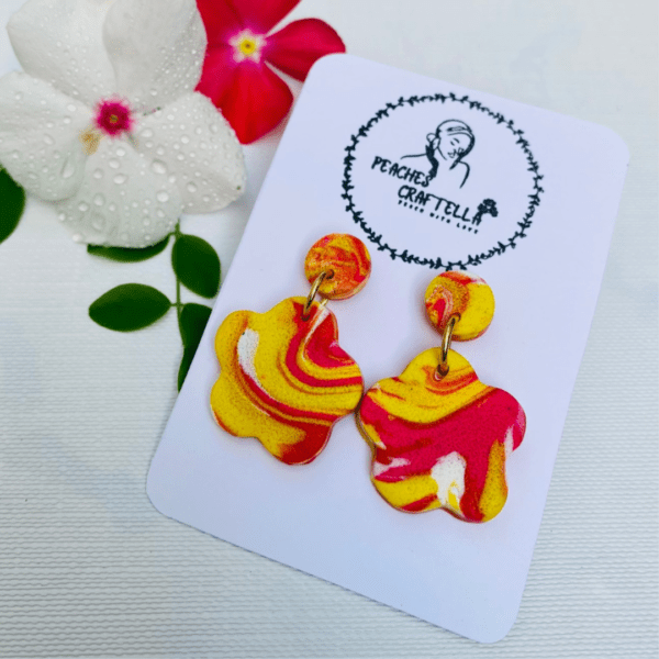 Sunshine Floral Earrings with a swirl of yellow, red, and white by Ishara Malshani Settinayake of Peaches Craftella.