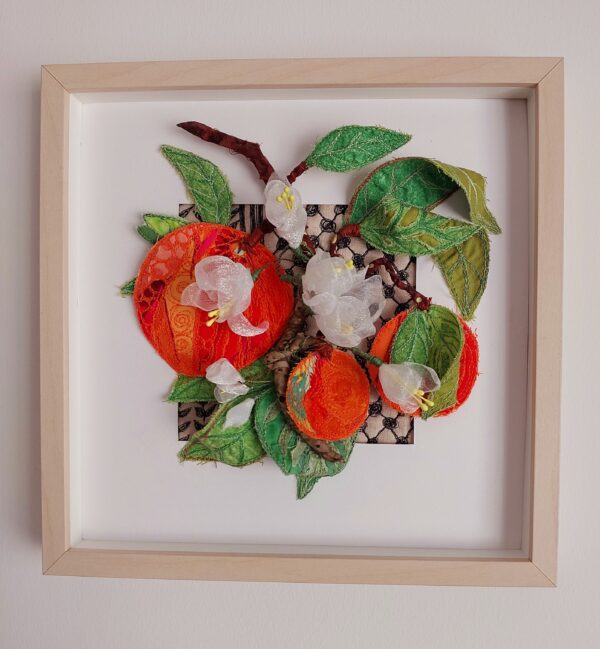 Handmade 3D Jaffa Oranges textile art in a wooden frame featuring organza roses and copper wire branches.