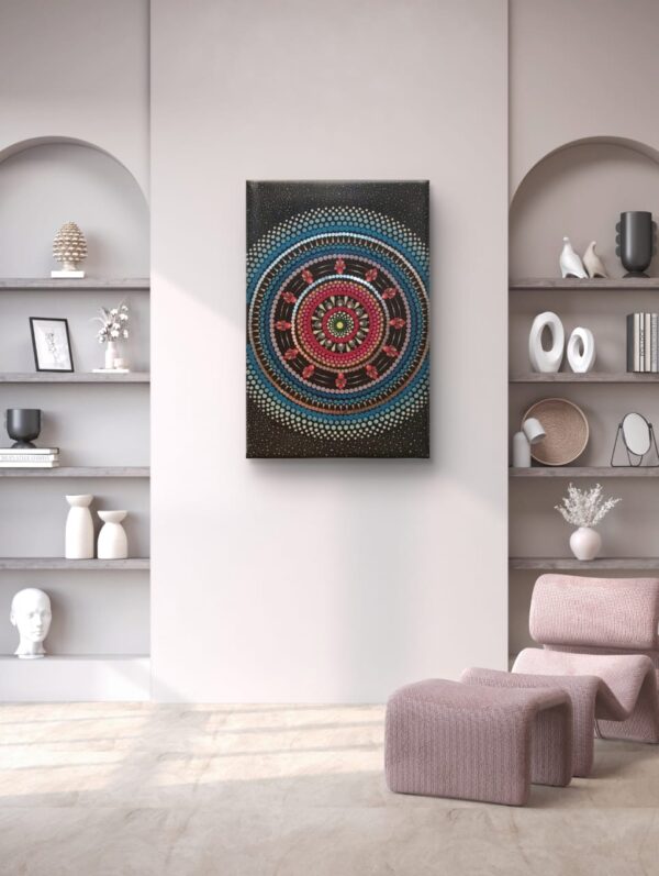 Cosmic Blossom Mandala, a 40x60 cm handcrafted mandala art on canvas by Krutika Jariwala, featuring cosmic-inspired patterns with vibrant pink, blue, and green details.