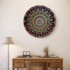 "Radiance of Life Mandala, a 30 cm handcrafted mandala art on canvas board by Krutika Jariwala, featuring vibrant patterns in red, blue, and green.