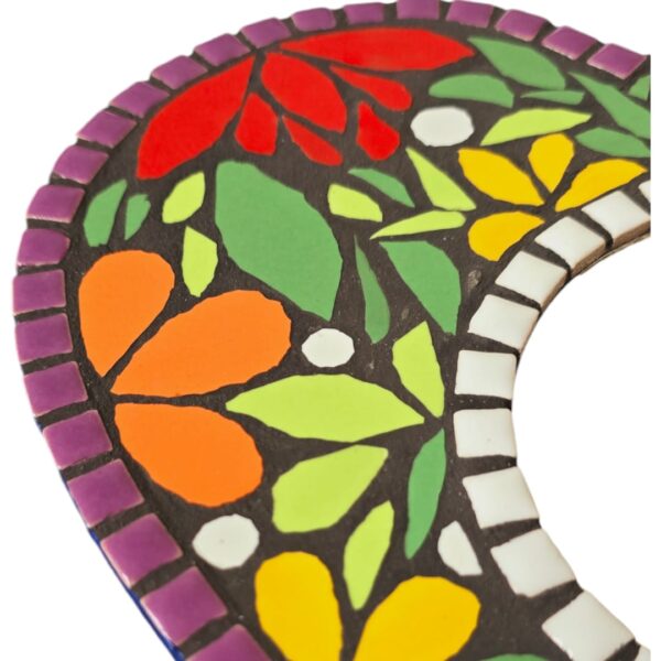 A Vibrant Heart Mosaic Mirror with a colorful floral design, handcrafted with ceramic tiles, featuring a 10 cm round mirror in the center on a 25 x 25 cm MDF base.