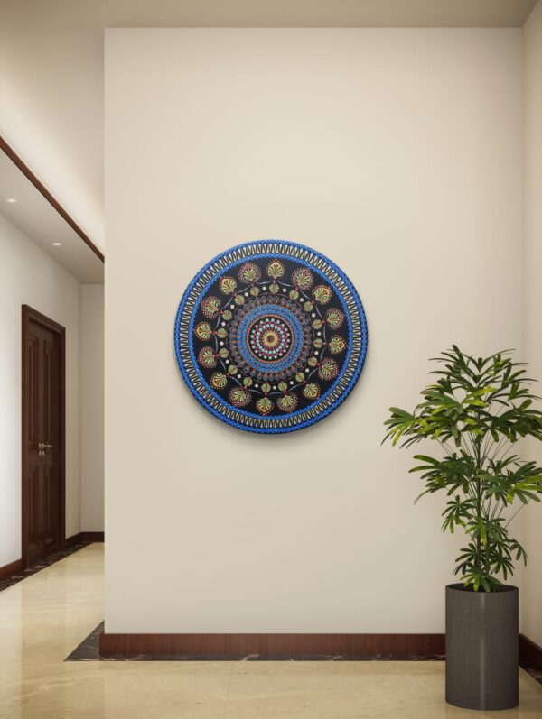 Blue Serenity Mandala, a 30 cm handcrafted mandala art on canvas board by Krutika Jariwala, featuring intricate patterns with calming blue, green, and gold tones.