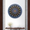 Blue Serenity Mandala, a 30 cm handcrafted mandala art on canvas board by Krutika Jariwala, featuring intricate patterns with calming blue, green, and gold tones.