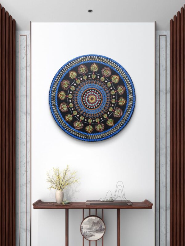 Blue Serenity Mandala, a 30 cm handcrafted mandala art on canvas board by Krutika Jariwala, featuring intricate patterns with calming blue, green, and gold tones.