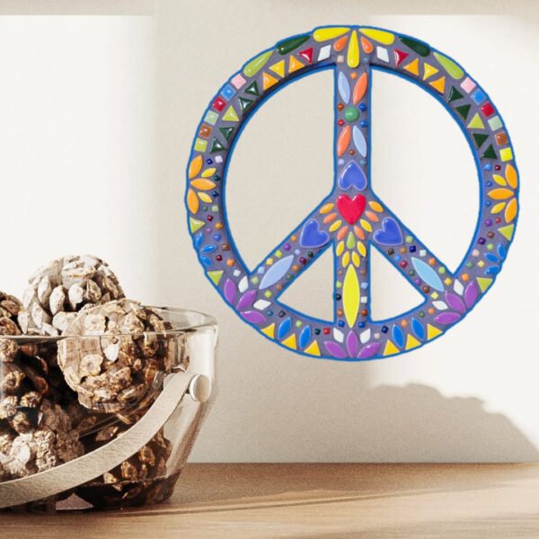 A round mosaic wall art featuring peace and love symbols, handcrafted with colorful ceramic tiles, sealed with grey color, and mounted on an MDF base, measuring 25 cm in diameter.