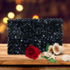 Black beaded cardholder, 10x6 cm, compact and stylish for carrying cards with elegance.