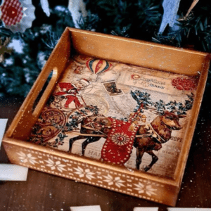 Vintage-inspired wooden Christmas tray with Santa, reindeer, and holiday illustrations.