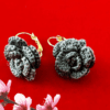 Handmade grey crochet rose earrings in floral design.