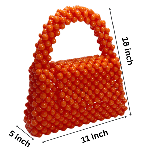 Handcrafted orange beaded bag with a unique, eye-catching design.