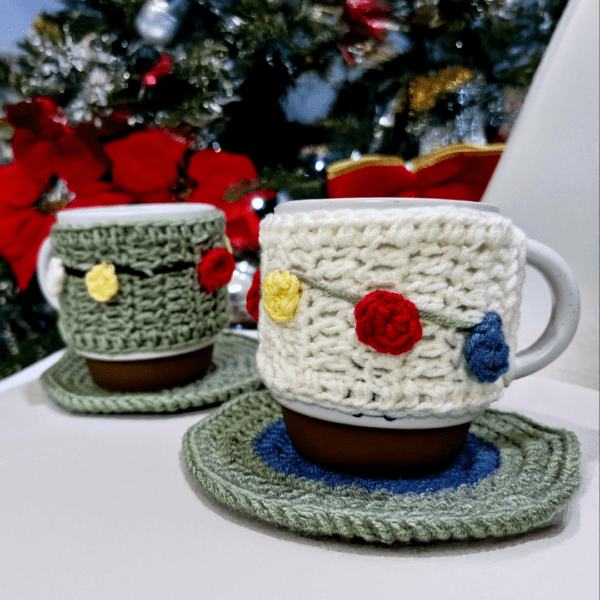 Handmade Blissful Brew Set featuring a crochet mug cover and matching coaster. Customizable colors include blue, red, green, and festive patterns. A perfect gift for tea and coffee lovers.