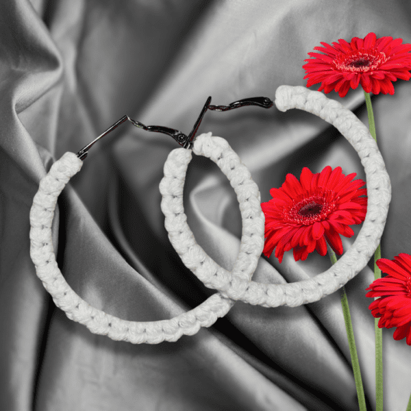 Handmade macrame earrings in classic white, circular hoop design by Rita Lewis.