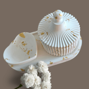 Four-piece gypsum set with a ribbed jar, heart-shaped container, and trinket tray, detailed with gold accents, ideal for décor and small storage.