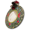 A handcrafted round Christmas Mosaic Mirror adorned with red and green ceramic and glass tiles, featuring a festive bow, pinecone, and bell decoration. Sealed in grey, 30 cm in diameter. Perfect for holiday décor.