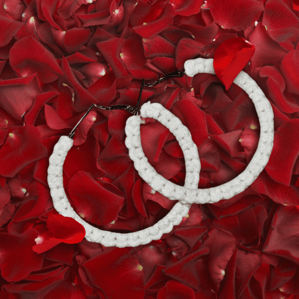 Handmade macrame earrings in classic white, circular hoop design by Rita Lewis.