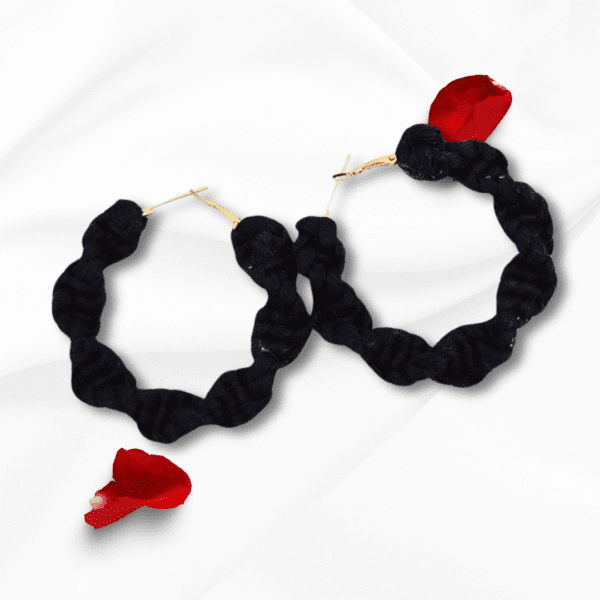 Handmade twisted black macrame earrings, circular hoop design by Rita Lewis