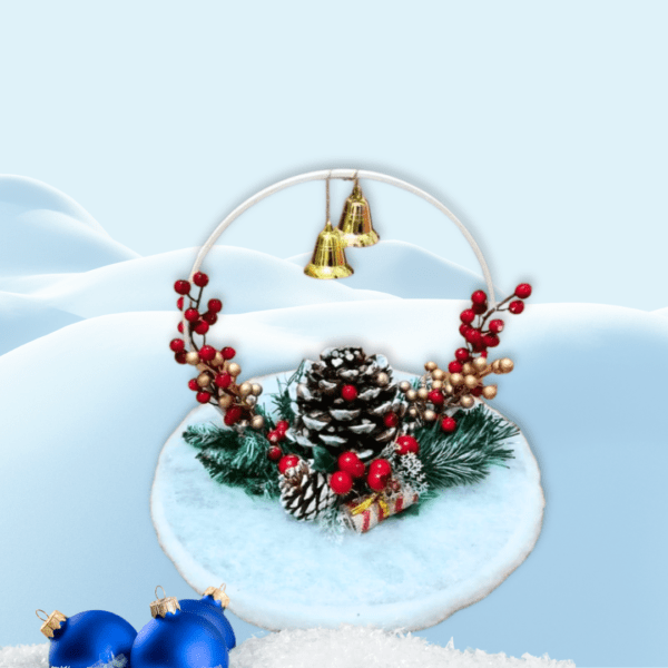 Festive pine cone decoration with berries, bells, and greenery on a wooden base.