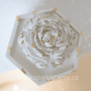 Gypsum rose on a hexagon tray with gold accents, perfect for home décor and fragrance infusion.