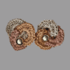 A pair of handmade Anastasia Ear Studs by Arty-Crafty by Vanessa, featuring intricate crochet circles in earthy tones with a subtle shimmer, embellished with sparkling studs