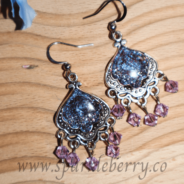 Handcrafted silver-tone earrings with glitter-filled resin, real Swarovski beads in lavender, lightweight at 3g, and 5 cm long