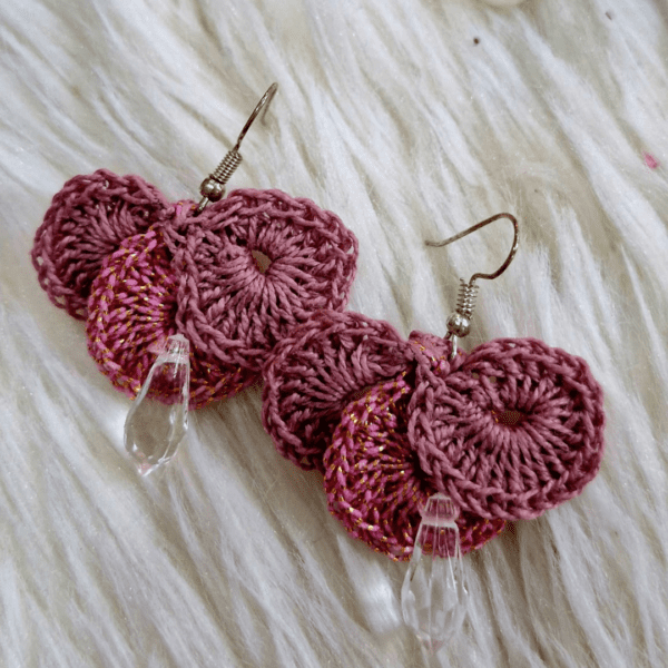 Handcrafted crochet earrings named Camilla Earrings, available in gold, pink, and white, with crystal bead accents