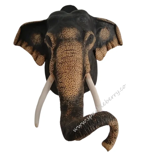 Handcrafted MajesticElephantWallSculpture, front-facing, made in Sri Lanka from fiber, showcasing intricate details and lifelike tusks.