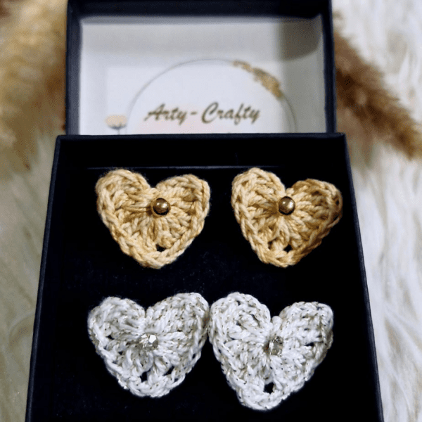 A pair of handcrafted Heart Stud Earrings made from delicate crochet