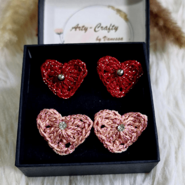 A pair of handcrafted Heart Stud Earrings made from delicate crochet