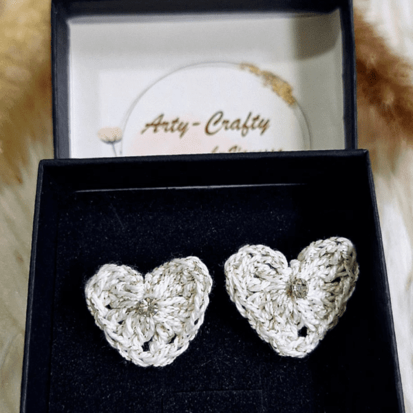 A pair of handcrafted Heart Stud Earrings made from delicate crochet