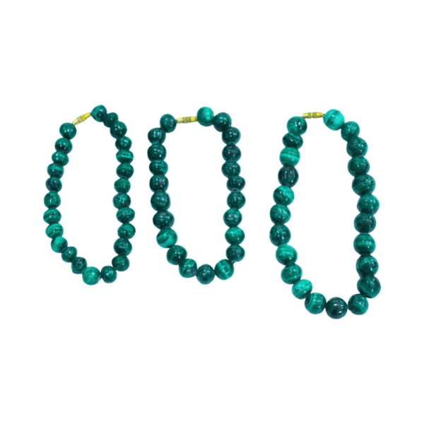 Handmade malachite bracelet with deep green natural beads, crafted in the Democratic Republic of the Congo. A powerful protection and healing stone.