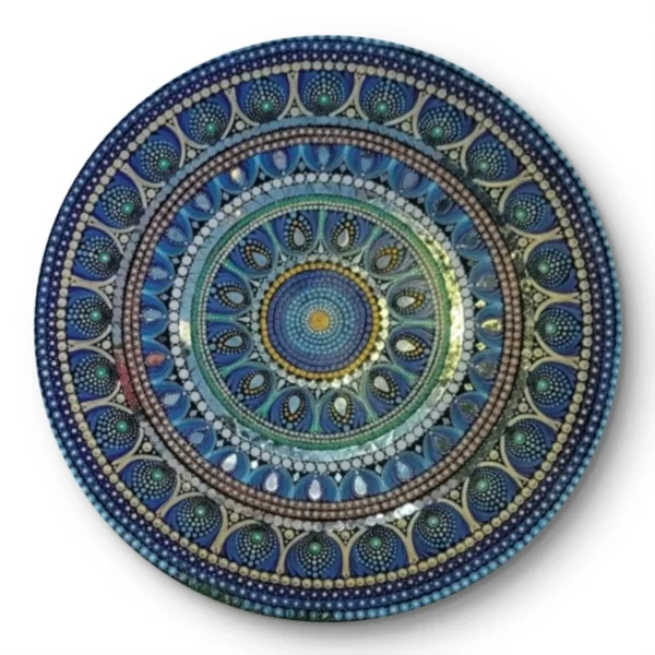 Detailed close-up of a blue mandala art piece with intricate hand-painted patterns.