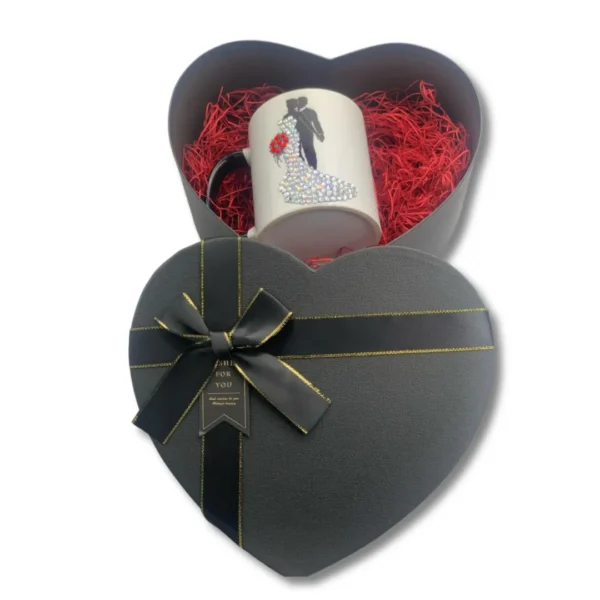 bridal mug with clear and red rhinestones, placed inside a heart-shaped black gift box.