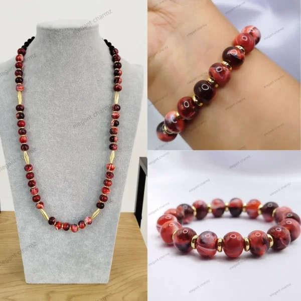 A handcrafted ceramic bead necklace and bracelet set featuring gold-plated spacer beads and a secure toggle clasp, displayed on a jewelry stand and worn on a wrist.