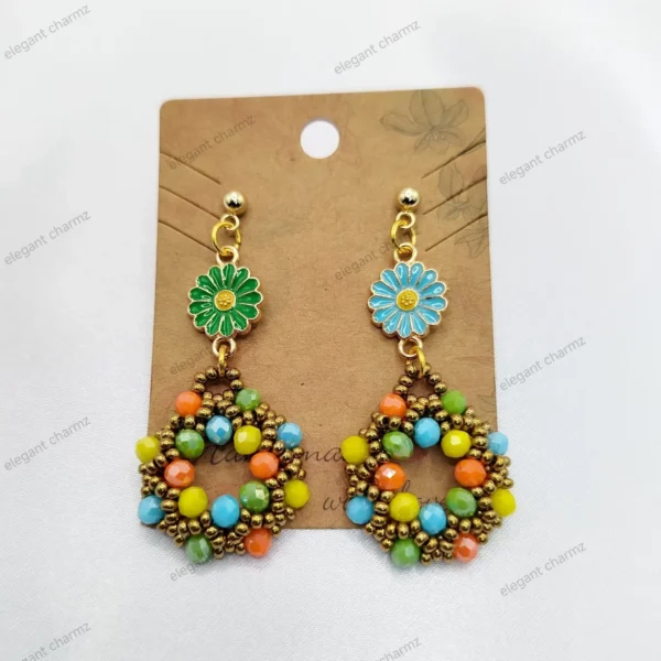 Colorful Boho Blossom handmade earrings featuring a floral stud and a beaded circular drop design with gold accents.